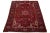This Hand-knotted Heriz wool rug has a red color field with multicolor accents all over the medallion motif. This rug...