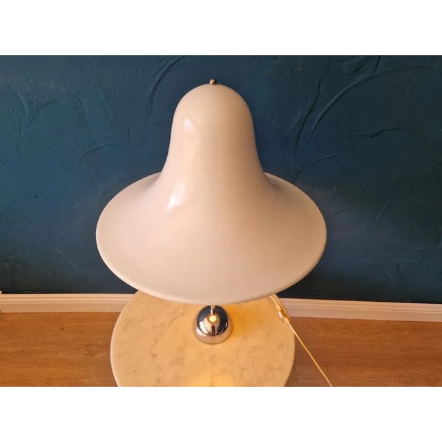 Very rare table lamp by Verner Panton, model Pantop by Elteva, produced in small numbers by Elteva Danmark, 1980. It is...