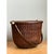 This vintage woven rattan Nantucket basket presents a robust yet refined silhouette, with a softly tapered, bucket-like...