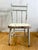 This petite 1890s child’s chair is a beautiful relic of time, perfect for a contemporary modern farmhouse aesthetic....