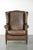 This beautiful large wing armchair with lovely colors is made of sheepskin and looks perfect in both classic and modern...