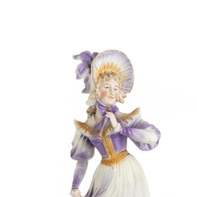 Porcelain - Two gallant figures - 19th century. European sculptures; in polychrome and gilded biscuit porcelain from the...