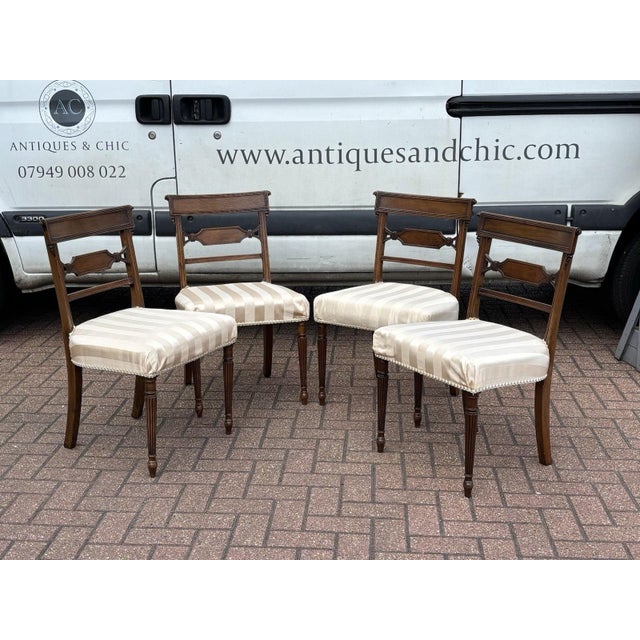 Set Of 4 Mahogany Dining Chairs. Heavy and very substantial. Sizes :- 80 cms tall , 50 cms width, seat height 47 cms There...