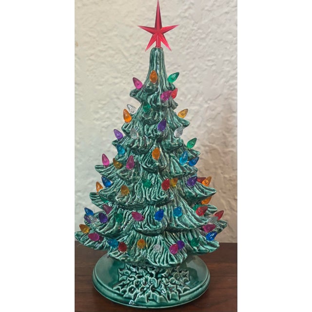 Charming ceramic lit Christmas tree, a favorite in the world of Christmas decor! These unique and one of a kind ceramic...