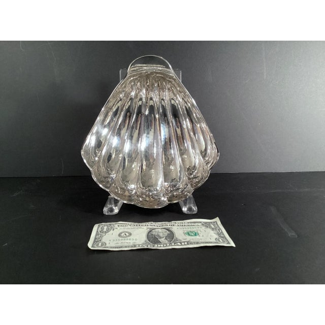 An exquisite sterling silver shell designed bowl for Bon bons, nuts, or your favorite treat. This has the ’925’ hallmark...