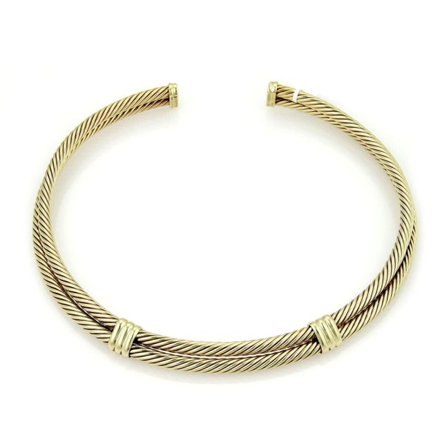 This is an elegant and beautiful necklace by David Yurman, the piece is finely crafted from solid 14k yellow gold with a...