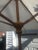 Vintage Custom Patio Umbrella With Intricate Iron Stand For Sale - Image 4 of 8