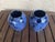 Her are a spectacular set of Brush McCoy iconic blue onyx drip glaze vases. They are in great condition. Dimensions 5.25”...