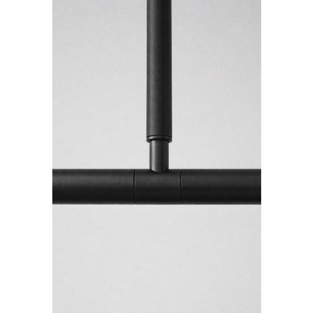 Elevate your interior with this stunning Mid Century Linear Brass Pendant Light, designed to blend timeless elegance with...