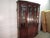 Item 87956: Henkel Harris solid mahogany china cabinet. Age: 1990's. Details: Two piece construction, lighted interior,...