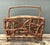 This striking vintage magazine rack is a quintessential example of Boho Chic design, featuring a sculptural, twig-inspired...