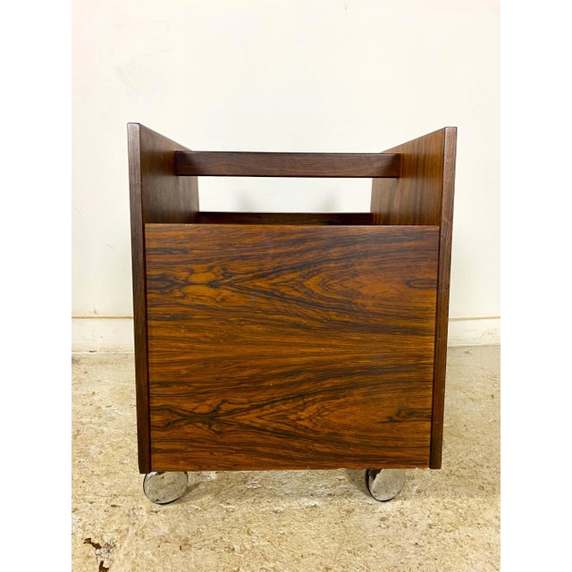 Super clean vintage magazine rack with makers mark on the bottom. Manufacturer: Bagn Mobelindustri, Made in Norway. Near...