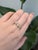 Three oval lab-grown diamonds sit in a row across this solid 14K yellow gold ring, 2.22 carats in all. Grown in a...