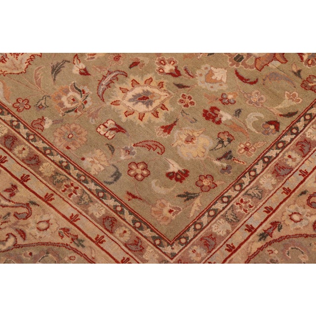 Designed with mesmerizing intricacy and gorgeous color palette, this hand-knotted masterpiece demonstrates the beauty and...