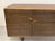 A wonderful artisan made cabinet that functions as a sideboard or credenza. Beautiful live edges on the four doors are...