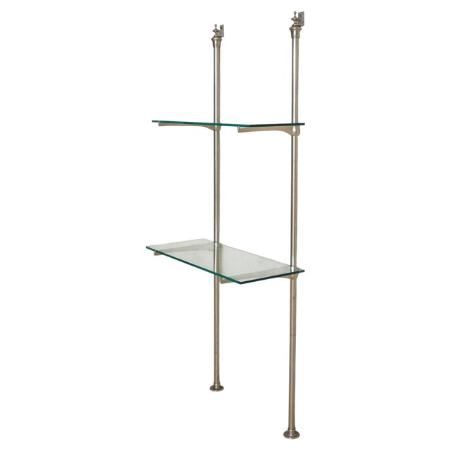 A rare example of early 20th-century French retail design, this étagère captures the spirit of the Art Deco era. Crafted...