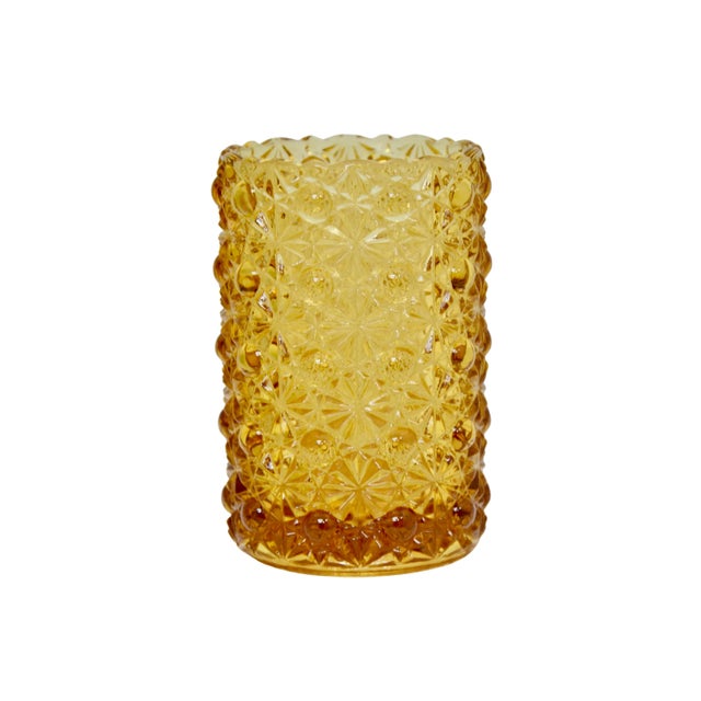 Vintage amber glass five inch cylinder vase or candle holder in the optic buttons & bows pattern. Simply a beautiful...