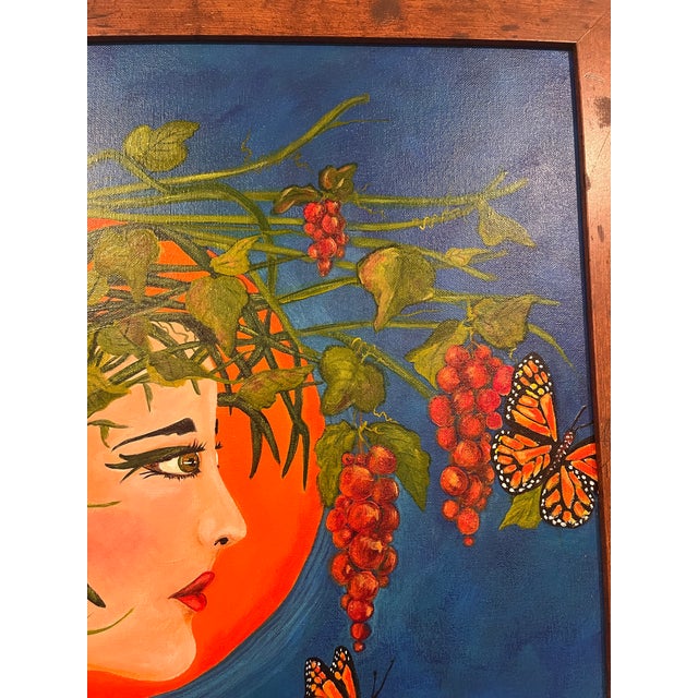 A striking and highly distinctive figurative artwork depicting a woman emerging from a dramatic landscape of grapevines,...