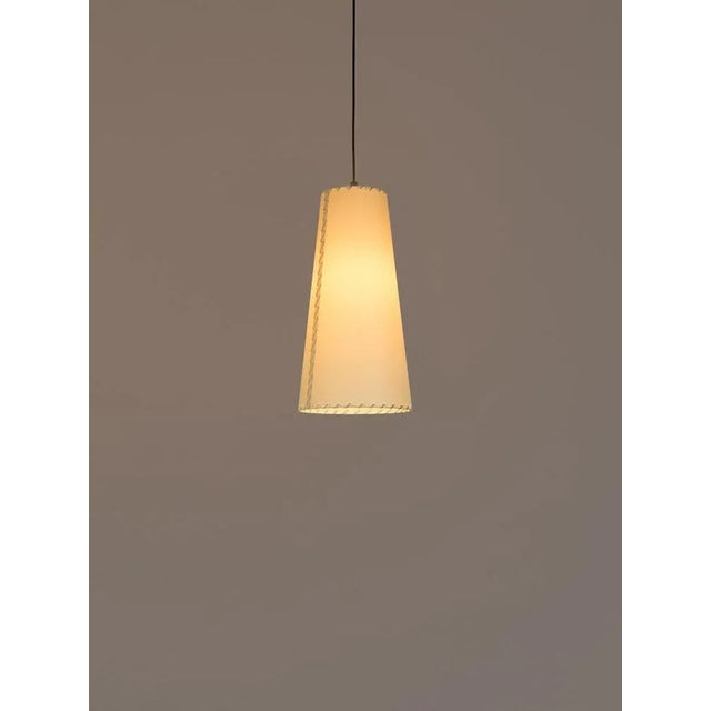 Sísísí cónicas largas mt2 pendant lamp by gabriel ordeig cole dimensions: d 20 x h 40 cm materials: metal, stitched...