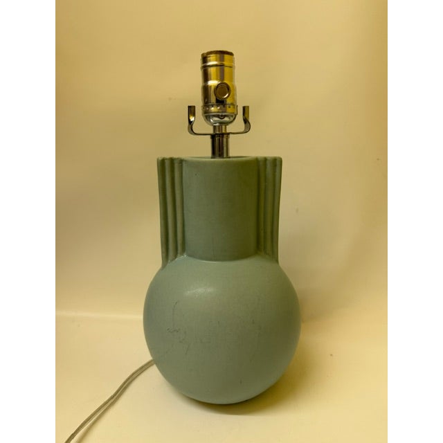 Add a soft pop of pastel color to your space with this striking vintage ceramic table lamp base. Finished in a soothing...
