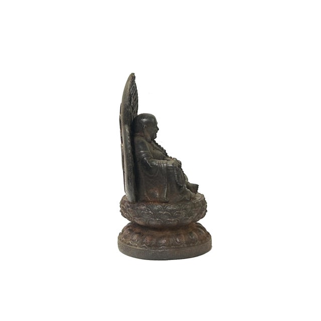 The Vintage Iron Metal Finish Rustic Happy Buddha Display Figure is a charming and unique decorative piece that exudes a...