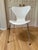 Set of 4 Series 7 chairs designed by Arne Jacobsen in 1955. White colored seat with chrome legs, manufactured in 1994 by...