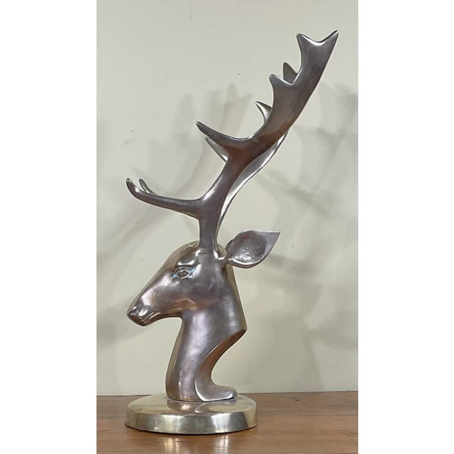 Elegant Mid-Century deer head made of solid brass, professionally mounted on a beautiful brass made.great decorative...