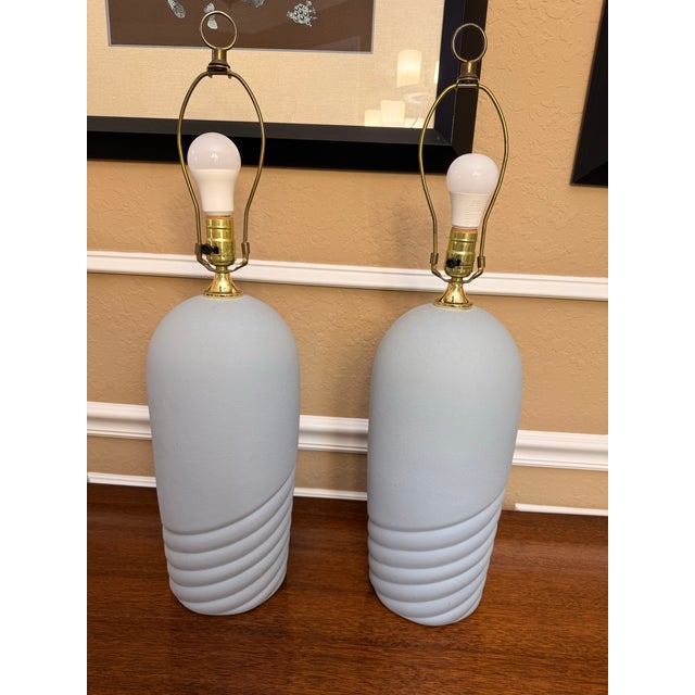 Elevate your space with this stunning, authentic pair of vintage 1980s postmodern table lamps attributed to Pacific Coast...