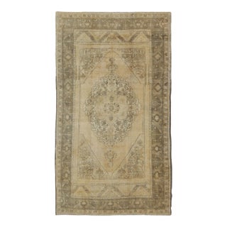 Antique Turkish Oushak With Stylized Medallion Design in Muted Neutral Tones For Sale