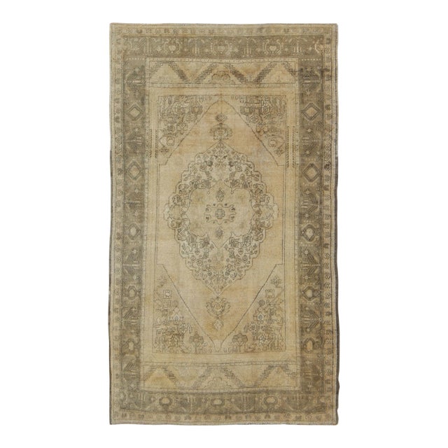 Antique Turkish Oushak With Stylized Medallion Design in Muted Neutral Tones For Sale