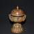 This elegant vintage bell is crafted from copper, featuring a warm, reddish-brown patina that gives it an antique, aged...