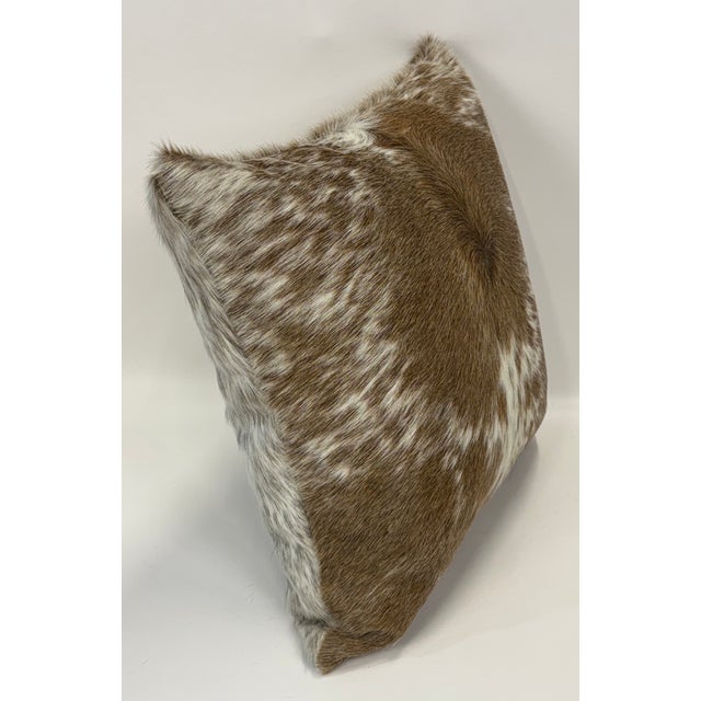 Bold yet refined, this 18” x 18” pillow cover is crafted from premium Brazilian cowhide featuring a distinctive natural...