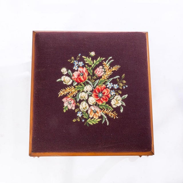 19th century needlepoint stool with stretcher base. Top is not connected but sits in the stool very tight and has an...