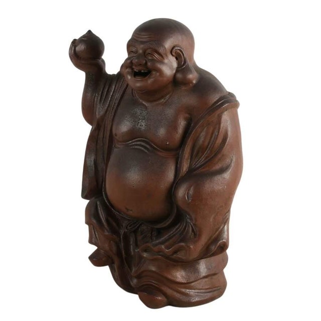 This Signed Concrete Laughing Buddha Statue is a cheerful and substantial decorative sculpture that embodies themes of...