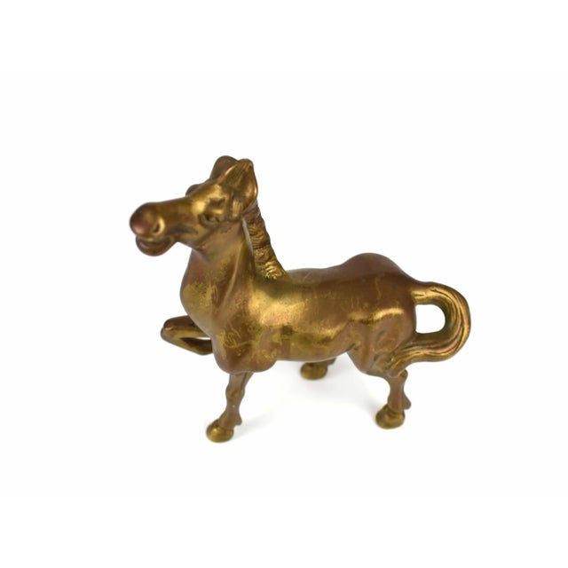 Stunning solid gold brass horse figurine. It is a beautiful piece to enhance any décor or great gift idea for a horse...