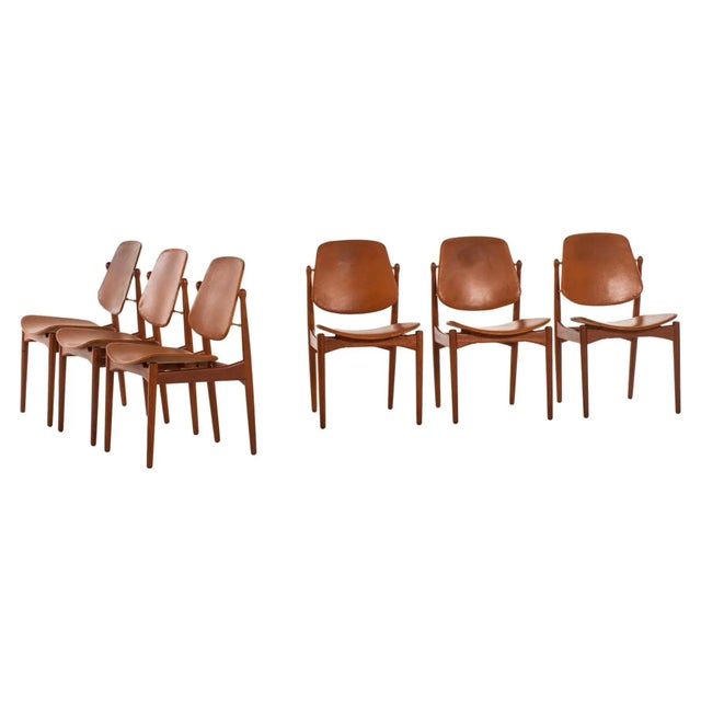 Rare set of 6 dining chairs model 203 designed by Arne Vodder. Produced by France & Daverkosen in Denmark. This piece has...