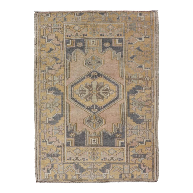 Vintage Oushak Rug From Turkey With Medallion Design in Yellow, Pink, Grey Blue For Sale