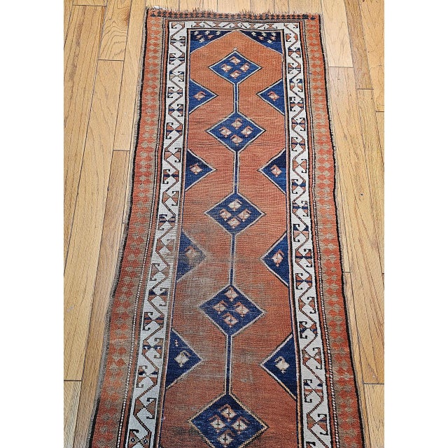 "Charming late 19th century hand knotted Persian Kurdish Runner. Originating from the skilled Kurdish weavers of Persia,...