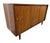 Elevate your space with this stunning 1960s American-made walnut sliding door cabinet, a true Mid-Century Modern classic....