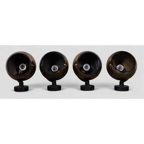 Set of 4 gold-coloured iGuzzini lamps with black base. Good condition with normal wear due to age. MEASURES Height 22cm...