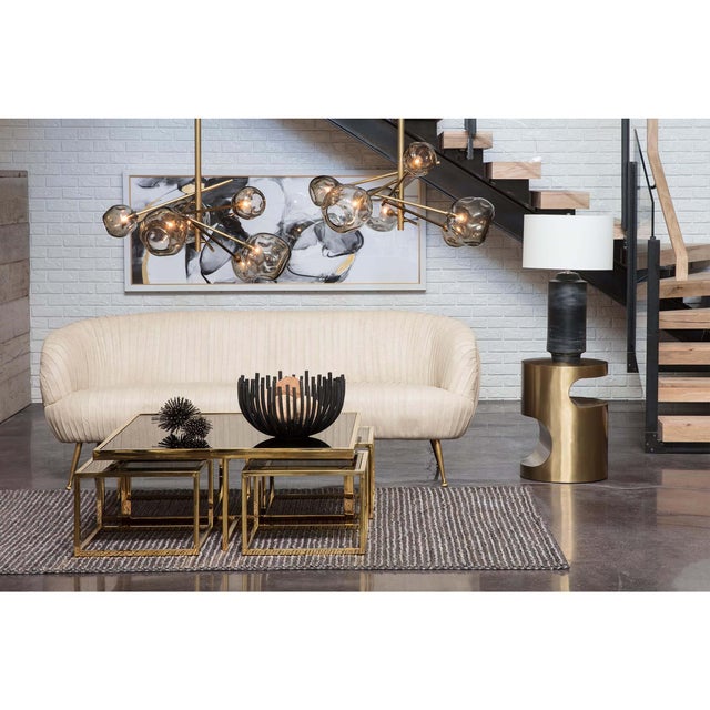 With a textural, timeworn finish, the Dayton ceramic table lamp has an earthly elegance that feels both industrial and...