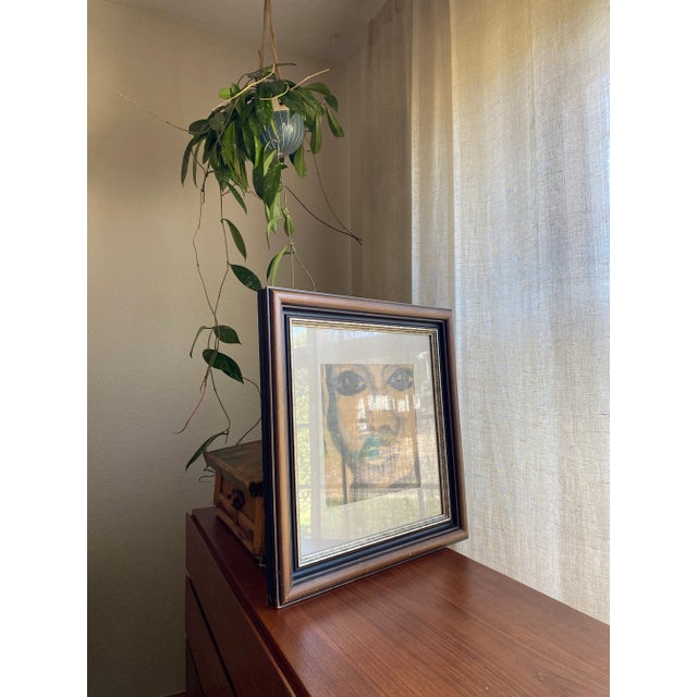 Contemporary Modernist original painting of striking portrait with expressive eyes, displayed under glass, and in a...