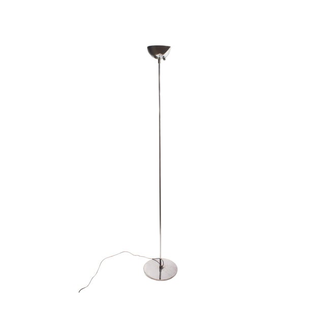 A Sonneman style torchiere floor lamp. In the style of designer Robert Sonneman, this lamp features a dome-like shade, a...