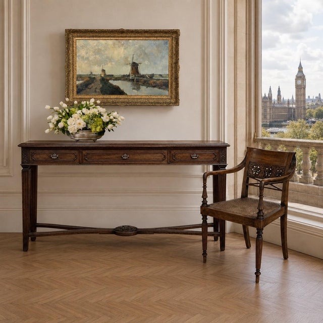 Graceful proportions and refined craftsmanship make this 19th century British armchair a wonderful example of Victorian...