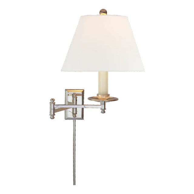 Dorchester Swing Arm in Polished Nickel with Linen Shade Designer: Chapman & Myers Finish: Polished Nickel Height: 15"...