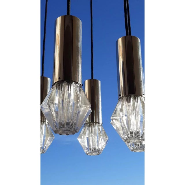 "Bankamp" Cascade/hanging lamp Object: Ceiling lamp 7 bulbs E14 Age: circa 1970s Color/Material:Chrome/Metal/Glass Mass:...