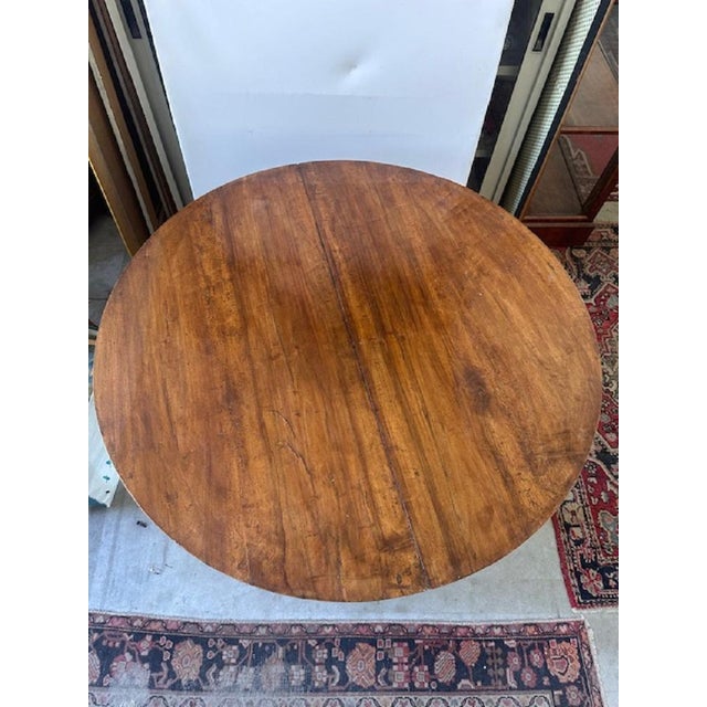 Louis Philippe rare extendable round table with four turned legs. Made of solid walnut wood. The extension fits into the...