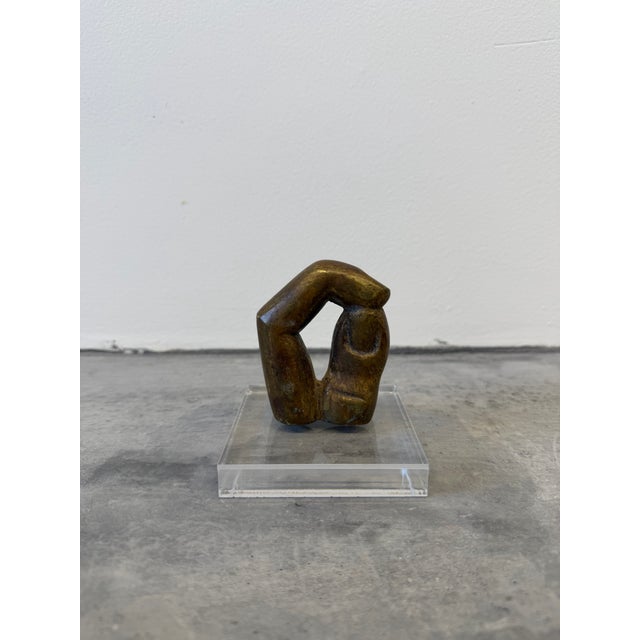 Modern bronze sculpture of two fingers snapping by unknown artist. Brazil 1980s.