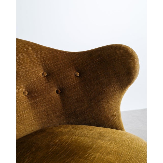 A very rare swedish mid century modern "gary / thumb" armchair in stained beech wood with an asymmetrical and sculptural...