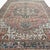 This antique Heriz rug is a timeless example of one of most iconic weaving traditions. The design is anchored by a large,...
